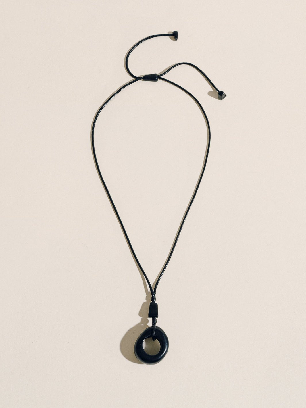 TAGUA CIRCLE PENDANT