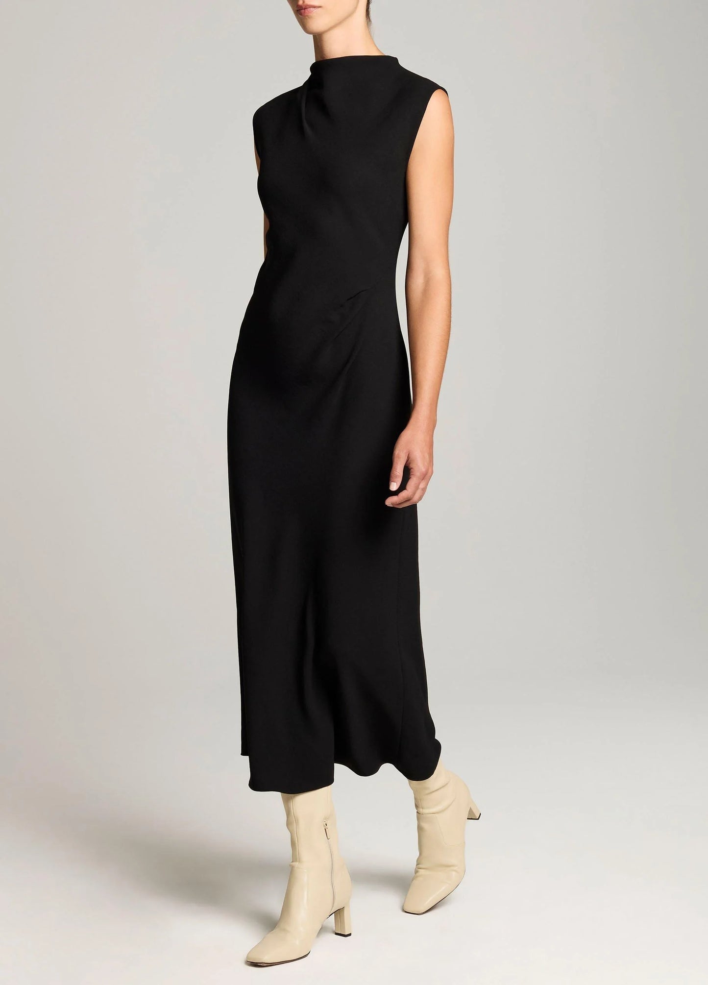 DRAPED FUNNEL NECK DRESS